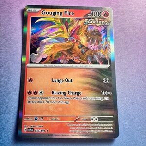 gouging fire - 038/191 (holo rare) — pokemon: surging sparks